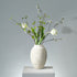 Konstgjord bukett Frozen Bloom med vita och rosa sidenblommor i frostinspirerad, elegant design. - FLORISSMA